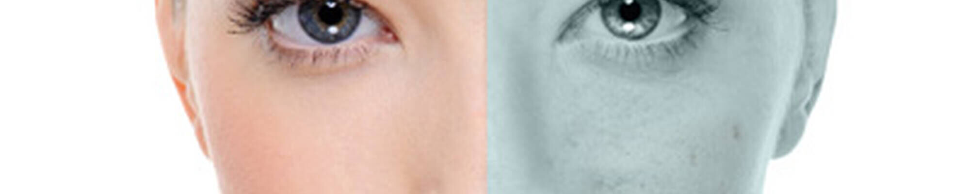 A close-up split image of an eye with one side showing a natural skin tone and the other in grayscale, highlighting contrasting textures and colors.