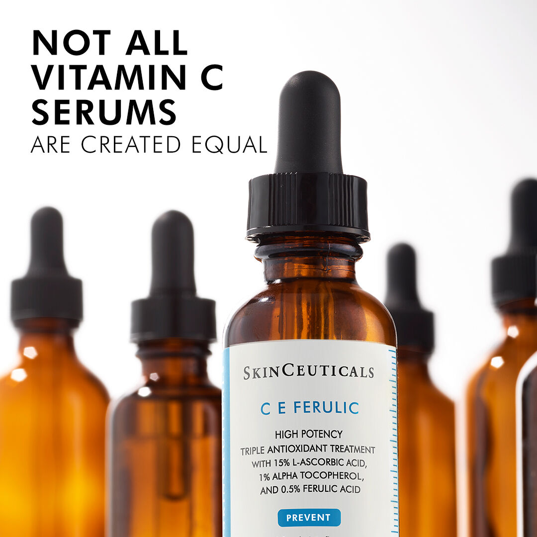 A close-up of a brown glass dropper bottle of SkinCeuticals C E Ferulic vitamin C serum, surrounded by similar bottles, with a text overlay that reads "Not all Vitamin C serums are created equal."